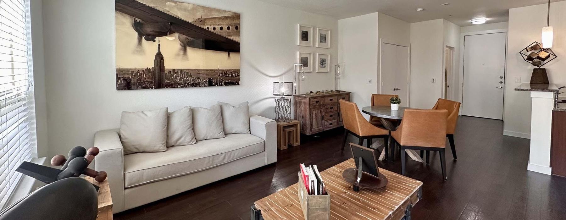 a living room with a couch and a table